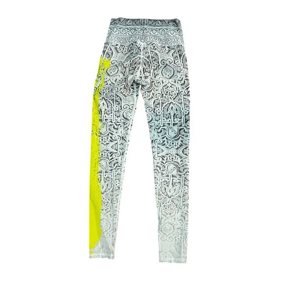 Niyama Sol Rare leggings with pattern and yellow on side no longer in print sz S - Picture 2 of 5